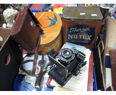 Thornes 'Nutex' and 'Bluebirds' Advertising Tins, Voigtlander folding camera, horn handled bottle opener with silver hallmark