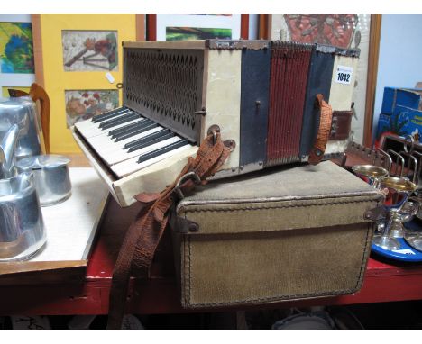 A Viking Brass Trumpet, cased and a Ludwig accordion. (2)