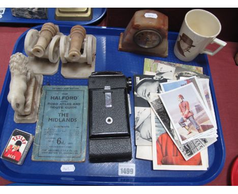 Alabaster Cased Mantel Clock, circa 1920's, pair of similar cannon book ends (damages), lion, camera, Churchill mug, publicit
