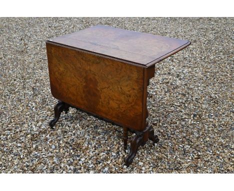 A Victorian walnut Sutherland table on turned gate-leg action base with ceramic casters&nbsp;&nbsp;