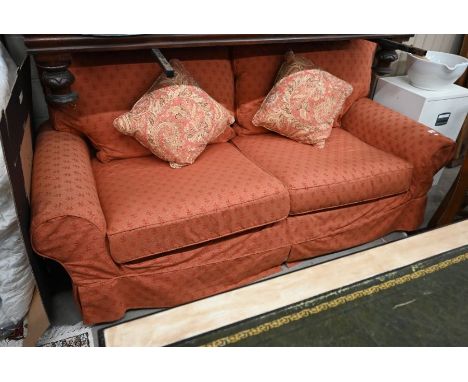 A country house two seater sofa with straight back and scroll arms c/w one set of patterned and one set of plain terracotta l