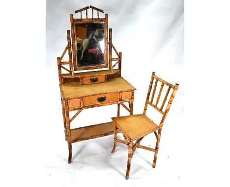 A late Victorian bamboo dressing table, with mirror back over two drawers and a pot shelf, 75 cm w x 43 cm x 157 cm h to/w a 