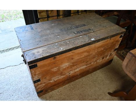 A large antique pine colonial service trunk with zinc lining by 'Thresher &amp; Glenny East India &amp; General Outfitters' w