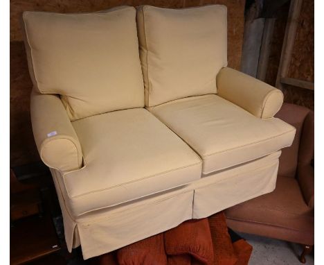 A Multi-York two seater scroll arm sofa with loose lemon yellow covers&nbsp;