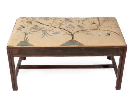 A George III Joined Oak Double Stool, 3rd quarter 18th century, with floral needlework and cream drop-in seat, the plain seat