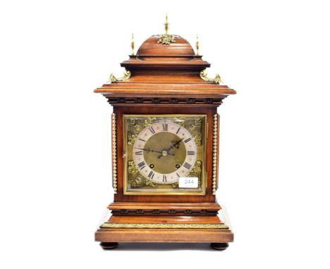 A Walnut Quarter Striking Table Clock, later 19th century, caddied pediment with applied gilt metal mounts, bevelled glass si