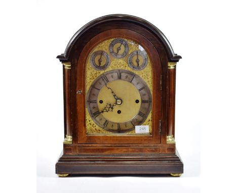 A Mahogany Chiming Table Clock, later 19th century, arched pediment, pierced side panels, stop brass fluted inset front colum