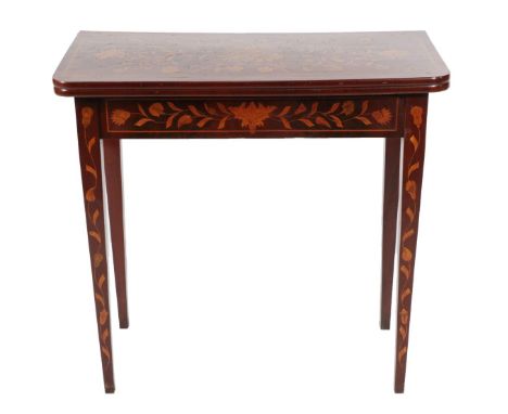 An Early 19th Century Dutch Mahogany and Marquetry Inlaid Foldover Card Table, the top richly inlaid with flowers and trailin