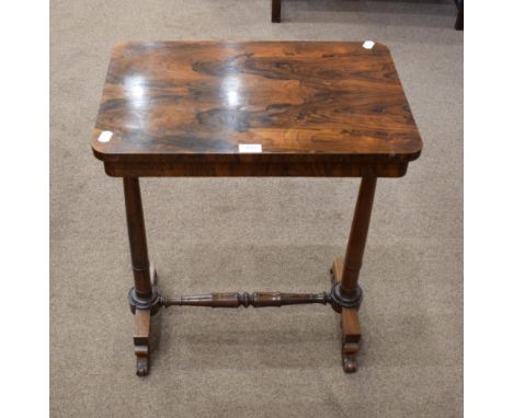 An Early Victorian Rosewood Side Table, mid 19th century, of rectangular form with a plain frieze, on tapering supports with 