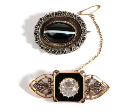 A Diamond and White Stone Set Mourning Brooch, a round white paste stone over a black enamel panel, to pointed sides, each in