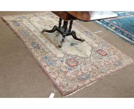 Ghom Prayer Rug Central Iran, circa 1960 The cream field with hanging lamp flanked by floral columns beneath the Mihrab enclo