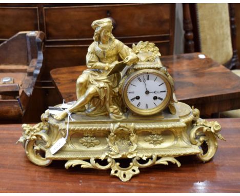 A Gilt Metal Striking Mantel Clock, circa 1890, case surmounted by a seated classical figure, enamel dial with Roman numerals