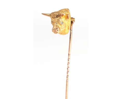 A Bull's Head Stick Pin, with old cut diamond eyes .  Good condition. Stamped '9CT'. Gross weight 9.7 grams.  CR 04.04.19