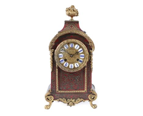 A Tortoiseshell and Brass Inlaid ''Boulle'' Striking Mantel Clock, late 19th century, elaborately decorated case with applied