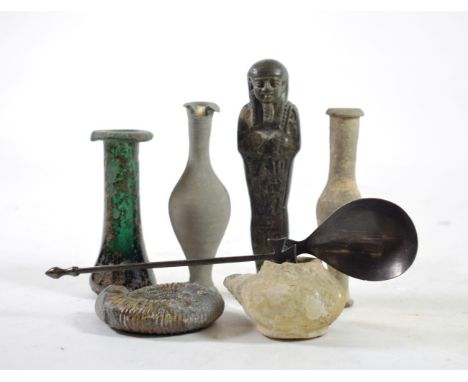 An Egyptian Style Shabti Figure, 13.5cm; A Roman Style Glass Phial, 10cm; A Terracotta Oil Lamp; Two Small Storage Jars; A Pe