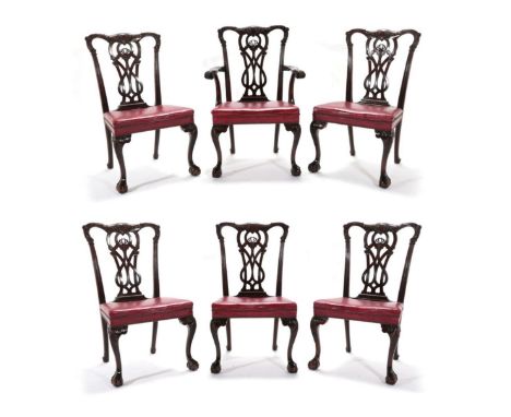A Set of Six Chippendale Revival Carved Mahogany Dining Chairs, circa 1900, including one carver, the carved top rails above 