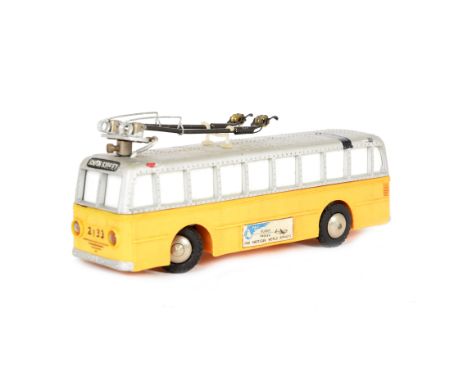 An Uncommon Silvine (Japan) HO Scale 2-Axle Trolleybus, yellow studded lower body, silver upper, (substantially copied from t