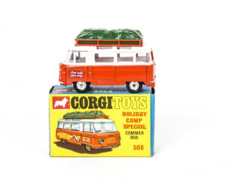 A Corgi Toys 508 Holiday Camp Special Commer Bus, white/orange body, green luggage cover, four brown suitcases, spun hubs, in