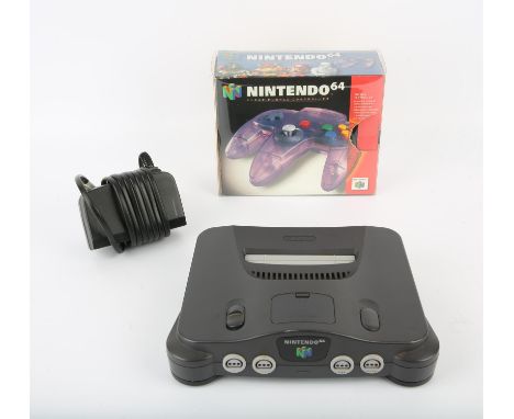 Nintendo 64 (N64) Console with boxed Clear Purple Controller + power supply Condition Report:  Console is loose and controlle