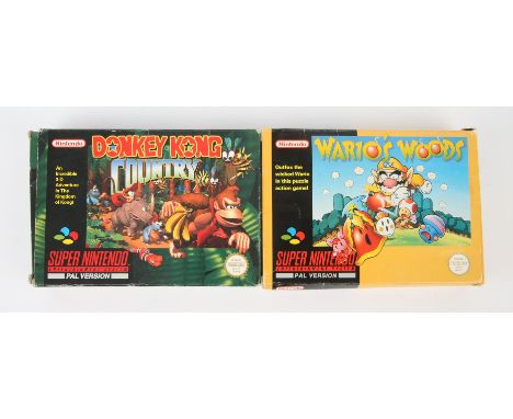 Super Nintendo (SNES) Nintendo classics bundle Includes: Wario's Woods and Donkey Kong Country Condition Report:  Games are b