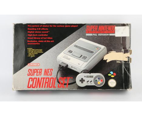 Super Nintendo System (SNES) Control Set (PAL) Condition Report:  Item is CIB and in used condition. 