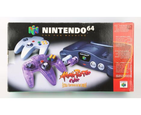 Nintendo 64 (N64) Console [Atomic Purple bundle] Condition Report:  Console is CIB and in great condition. 