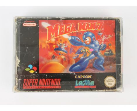 Super Nintendo (SNES) Mega Man 7 game (PAL) Condition Report:  Item is boxed, without its manual and the outer box has extrem