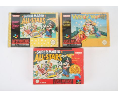 Super Nintendo (SNES) Super Mario bundle Includes: Wario's Woods, Super Mario All-Stars [Red Box Variant] and Super Mario All