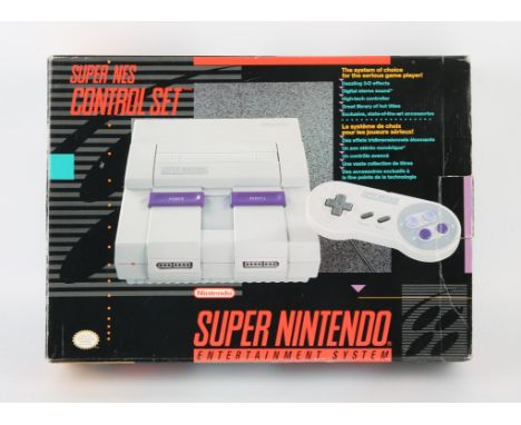 Super Nintendo System (SNES) Control Set (NTSC) Condition Report:  Item is CIB and in great condition. There is some yellowin