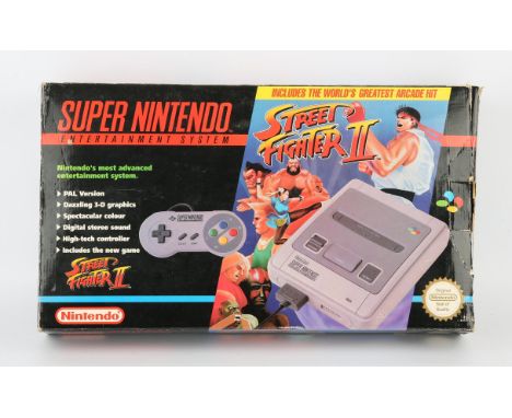Super Nintendo System (SNES) Street Fighter 2 Edition (PAL) Condition Report:  Item is CIB and in great condition. There is g