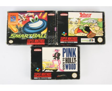 Super Nintendo (SNES) platforming bundle Includes: Asterix, Pink goes to Hollywood and Smartball Condition Report:  Asterix a