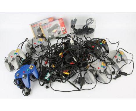 A large assortment of Nintendo 64 (N64) cables, plugs, accessories (both first and third party) Condition Report:  All items 