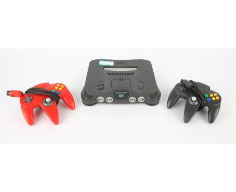 Nintendo 64 (N64) Console + 1 black controller, 1 red controller & power supply Condition Report:  Items are all loose and in