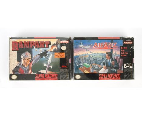 Super Nintendo (SNES) strategy bundle Includes: Rampart and Aerobiz Condition Report:  Rampart is CIB and Aerobiz is missing 
