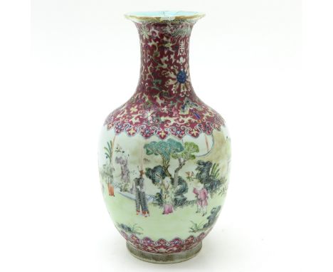 Ruby ground with Famille Rose enamels depicting Chinese figures in garden, Daoguang mark, 32 cm. tall, restored.