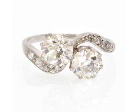 Set with 2 diamonds, each more than 1 Ct., ring size 17.