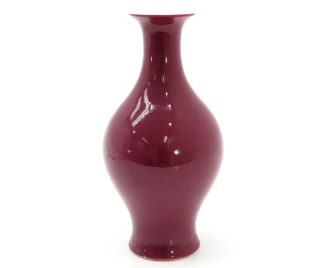 Ruby glaze, marked with double ring, 25 cm. tall. 