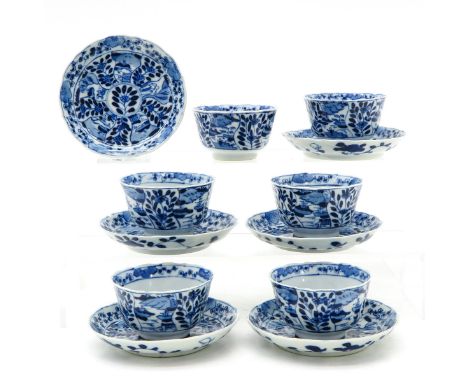 Floral decor, Kangxi mark, saucers are 10 cm. in diameter, with hairline.