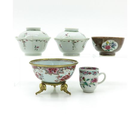 Including bowls and cup, some 18th Century, serving bowl is 14 cm. in diameter, some with chip and hairline.