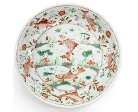 Fish and pond decor, marked with double ring and lozenge, 31 cm. in diameter.