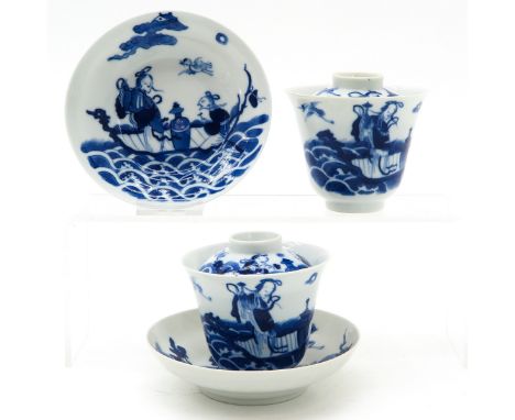 Decorated with gathering of Chinese figures in garden, saucers are 12 cm. in diameter, one saucer with hairline in glaze.