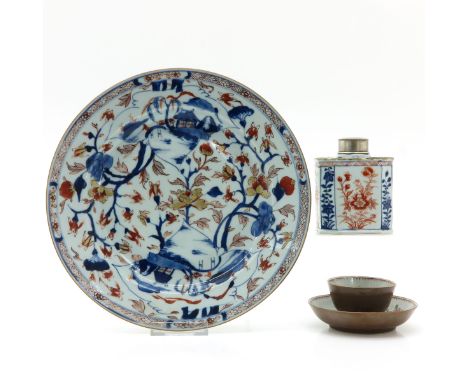 Including Imari tea caddy, an Imari plate, and Famille Rose cup and saucer, 18th Century, plate measures 28 cm. in diameter, 