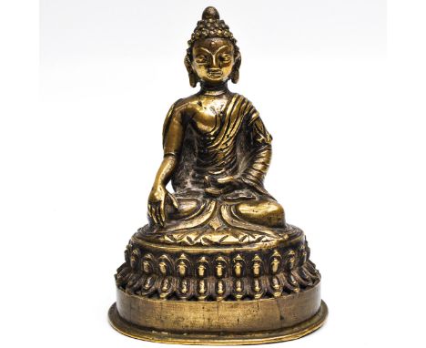 17th - 18th Century, depicting Buddha sitting atop lotus pedestal holding cup, 15 cm. tall. 