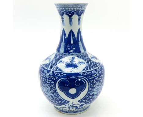 Decorated with florals, marked with double ring on bottom, 39 cm. tall.