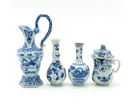 Including two vases, a cup, and ewer, including 18th Century, ewer is 27 cm. tall, in diverse conditions.