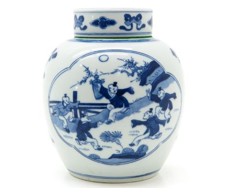 Decorated with boys playing in garden, marked with double ring on bottom, 20 cm. tall.  