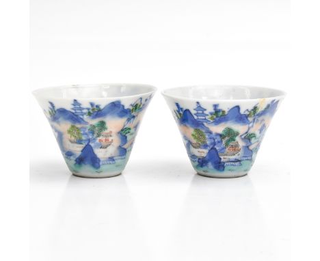 Depicting landscape scenes, marked with seal mark on bottom, 6 cm. in diameter, one cup restored.