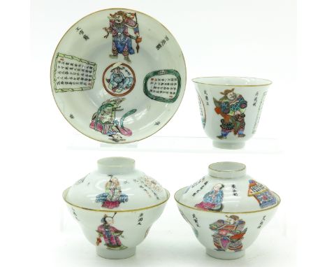 Famille Rose enamels depicting Chinese figures in Wu Shuang Pu decor, including Daoguang mark, saucers are 15 cm. in diameter