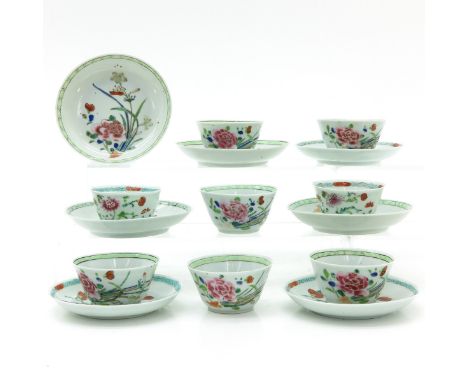 Floral decor, saucers are 11 cm. in diameter, some with small chips on edges and hairline.