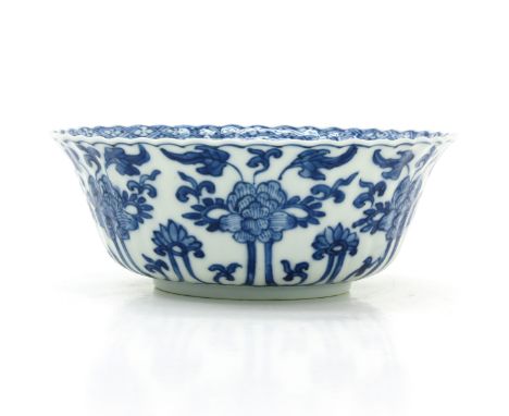 Ribbed decor with flowers, center of bowl decorated with bird in garden, marked with double ring, 15 cm. in diameter, frittin